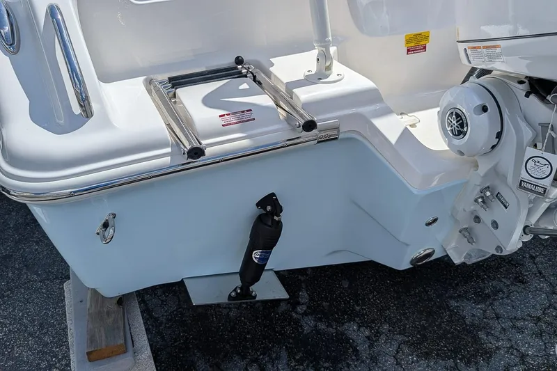 Slide: The Image of 2026 Key West 239 FS boat stern with ladder and Yamaha engine. - 5
