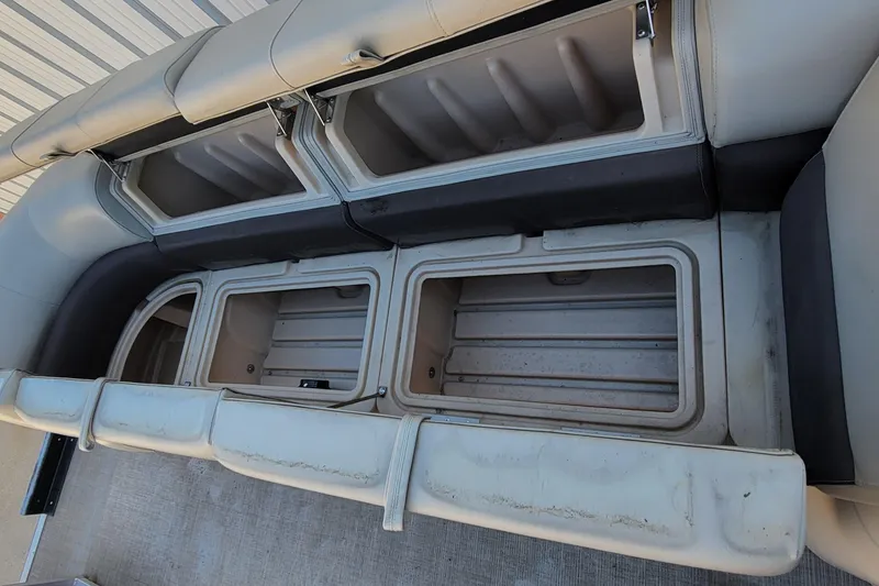 Slide: The Image of 2019 Sun Tracker Party Barge 24 DLX helm with steering wheel and control panel. - 27