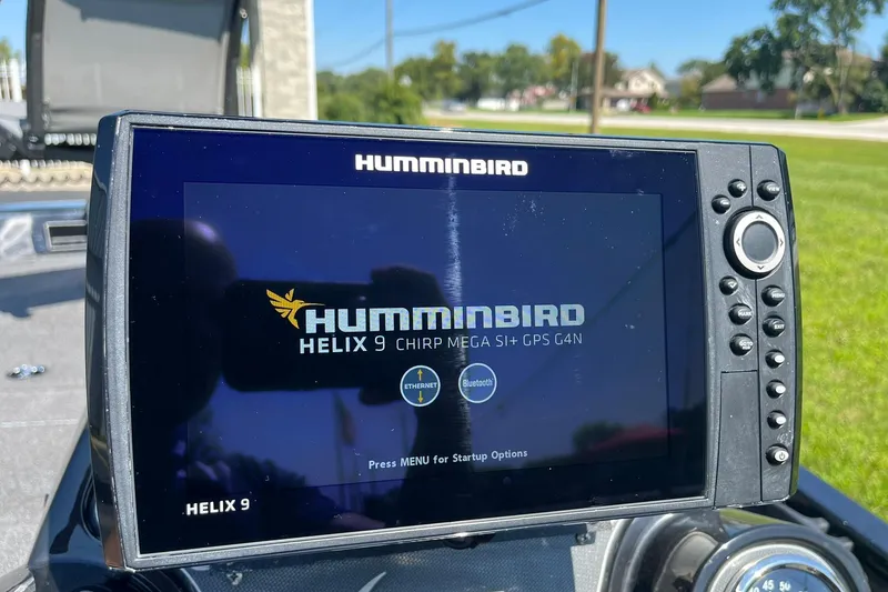 Slide: The Image of Humminbird Helix 9 fish finder on 2019 Lowe Stinger 175C boat dashboard. - 13