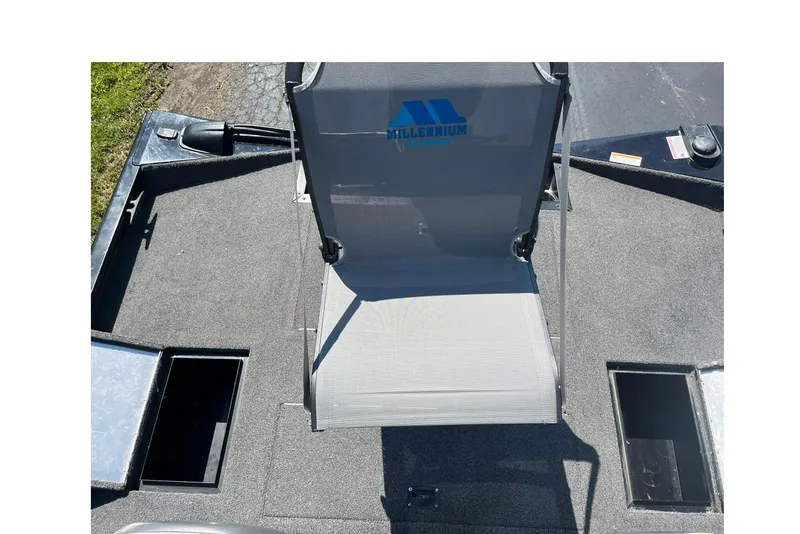 Slide: The Image of 2019 Lowe Stinger 175C boat deck with Millennium Marine seat and storage compartments. - 22
