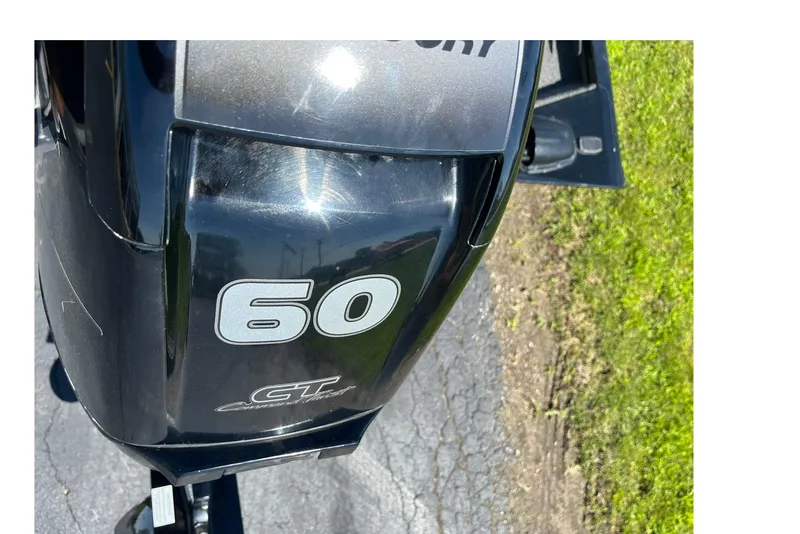 Slide: The Image of 2019 Lowe Stinger 175C boat with a 60 HP Mercury outboard motor. - 25