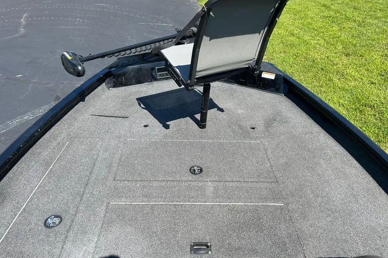 Slide: The Image of 2019 Lowe Stinger 175C boat deck with seat and trolling motor. - 9