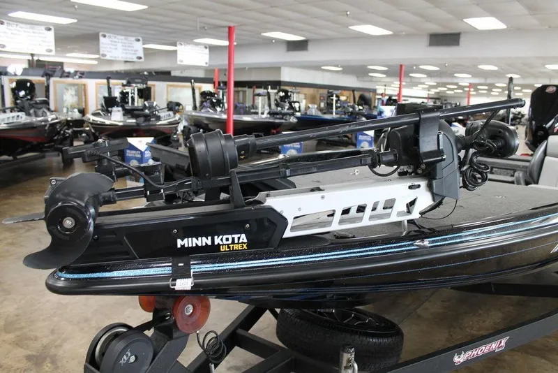 Slide: The Image of 2024 Phoenix 721 Pro XP boat with Minn Kota Ultrex trolling motor in showroom. - 3