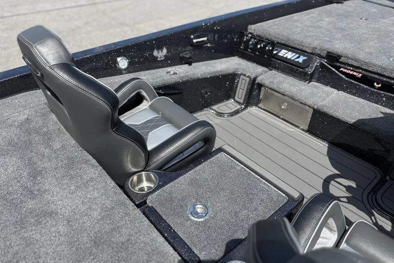 Slide: The Image of Interior of 2026 Phoenix 920 Elite X boat with sleek seating and modern design. - 16