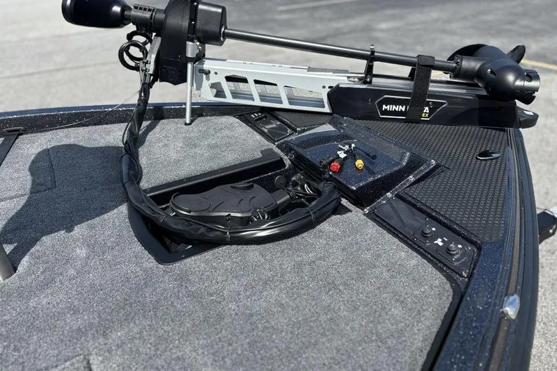 Slide: The Image of 2026 Phoenix 920 Elite X boat deck with Minn Kota trolling motor. - 19