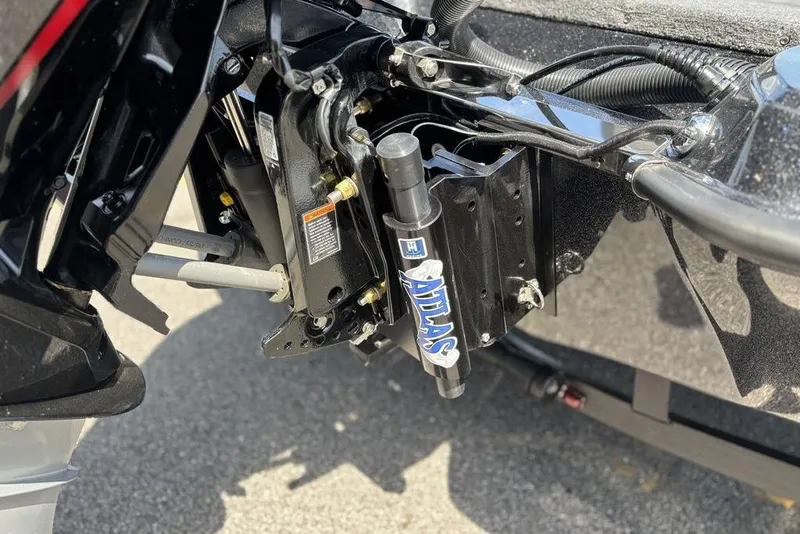 Slide: The Image of Close-up of Phoenix 920 Elite X 2026 boat engine mount and hydraulic system. - 23