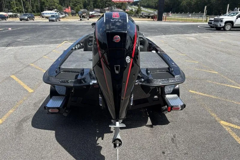 Slide: The Image of 2026 Phoenix 920 Elite X boat on trailer, rear view in parking lot. - 4