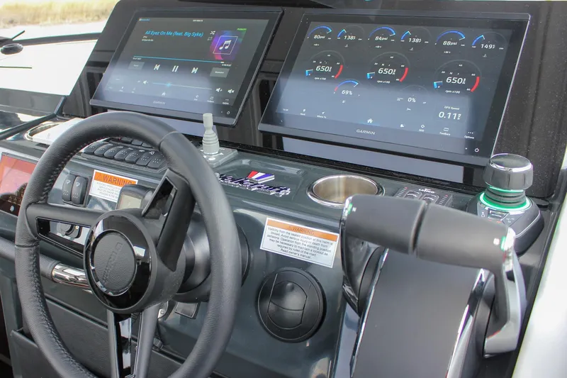 Slide: The Image of 2026 Wellcraft 38 Explorer dashboard with advanced navigation and control systems. - 23