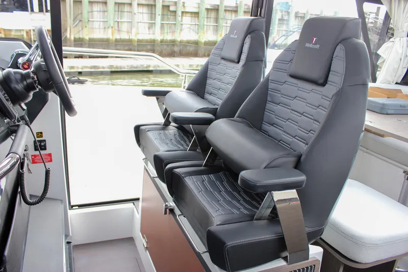 Slide: The Image of Luxury seating in 2026 Wellcraft 38 Explorer boat cockpit. - 25