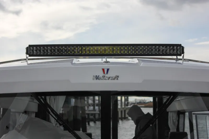 Slide: The Image of 2026 Wellcraft 38 Explorer boat with LED light bar on top. - 35