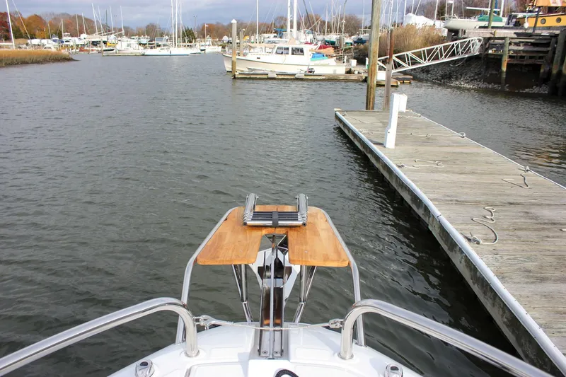 Slide: The Image of Bow view of 2026 Wellcraft 38 Explorer at a marina dock. - 36