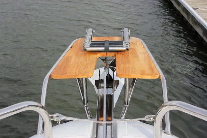 Slide: The Image of Bow view of 2026 Wellcraft 38 Explorer with wooden platform and ladder. - 37