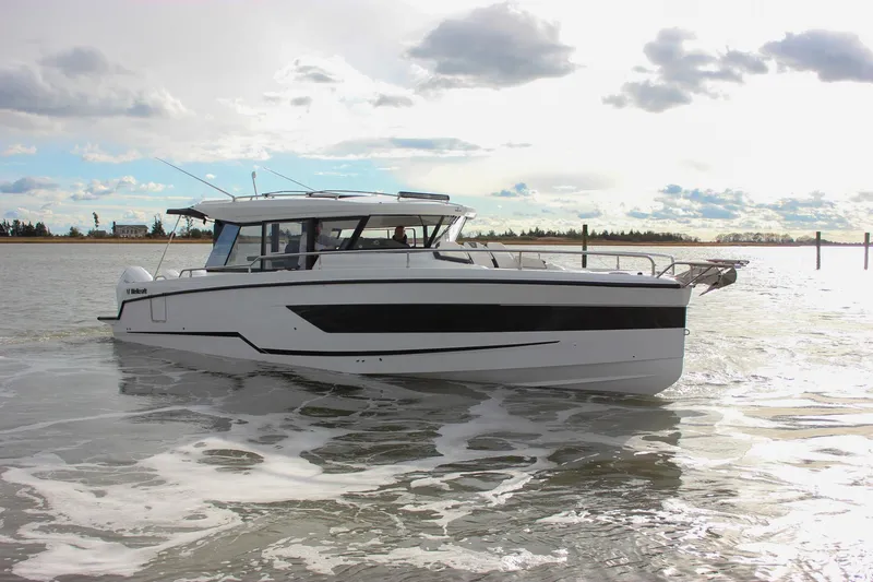 Slide: The Image of 2026 Wellcraft 38 Explorer boat cruising on a sunny day. - 43