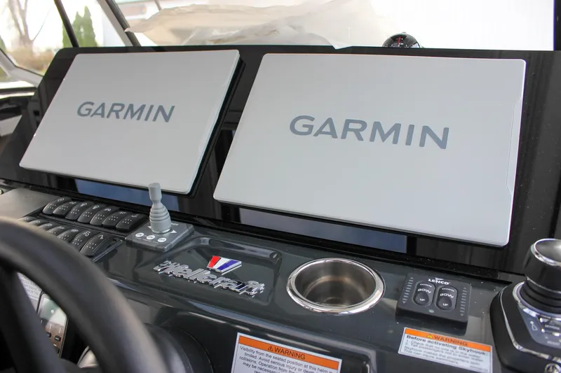 Slide: The Image of Control panel of 2026 Wellcraft 38 Explorer with dual Garmin displays. - 54