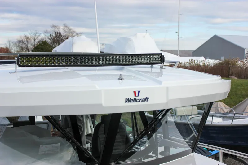 Slide: The Image of 2026 Wellcraft 38 Explorer boat with LED light bar on deck. - 58