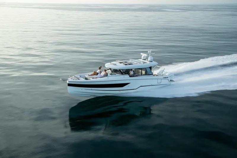 Slide: The Image of 2026 Wellcraft 38 Explorer cruising on calm ocean waters. - 61