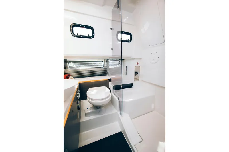 Slide: The Image of 2026 Wellcraft 38 Explorer boat roof with skylights at dock. - 8