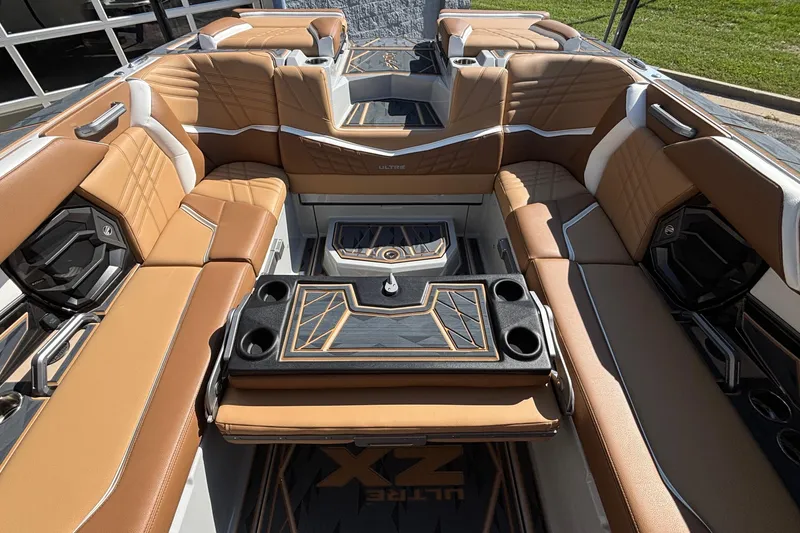 Slide: The Image of Luxurious interior of 2025 Tigé Ultré 25ZX boat with tan leather seating and modern design. - 30