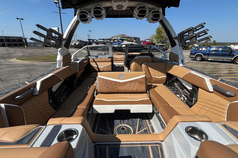 Slide: The Image of Luxurious interior of 2025 Tigé Ultré 25ZX boat with tan leather seating and modern design. - 33