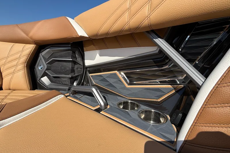 Slide: The Image of Luxurious interior of 2025 Tigé Ultré 25ZX boat with premium leather seating and speaker system. - 53