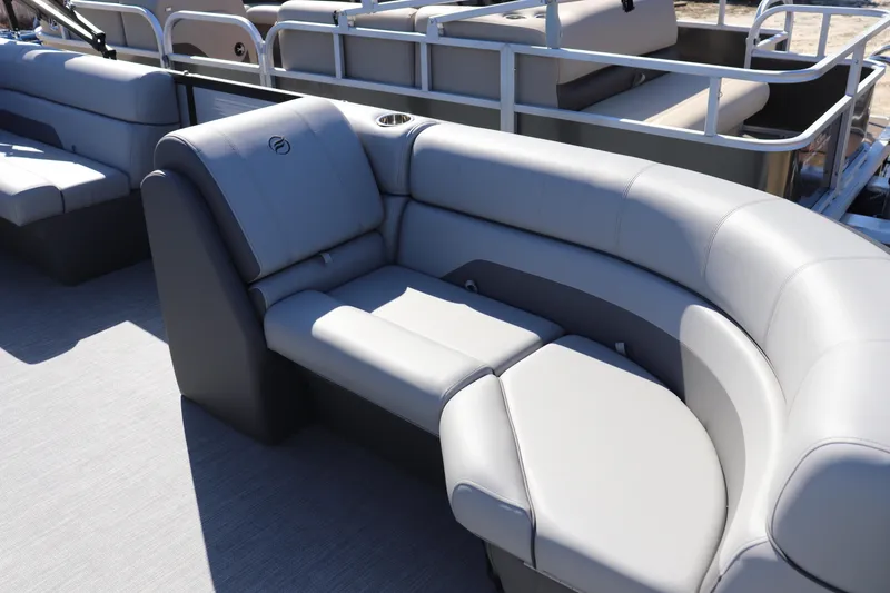 Slide: The Image of Luxurious seating on 2025 Flagship Freedom 20 LS pontoon boat, featuring sleek gray upholstery. - 3