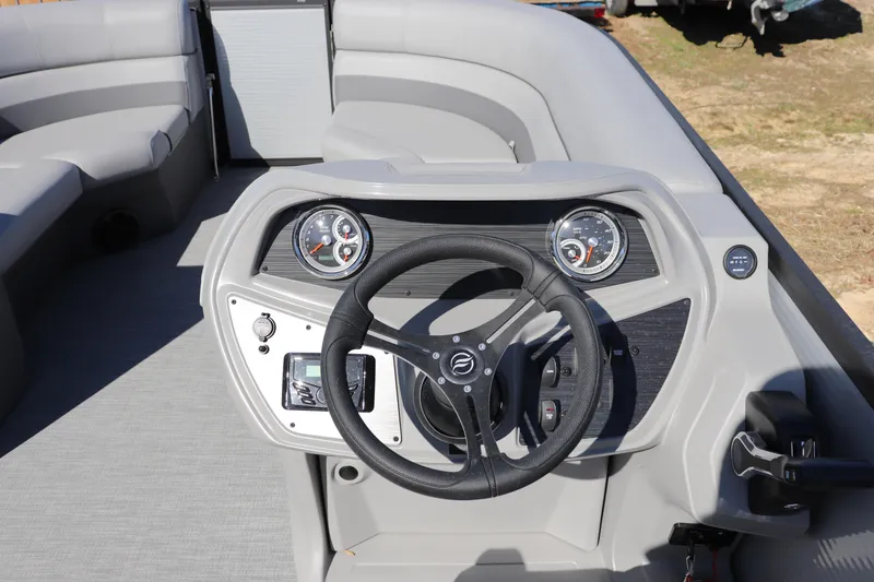 Slide: The Image of Steering console of 2025 Flagship Freedom 20 LS boat with modern gauges and controls. - 5