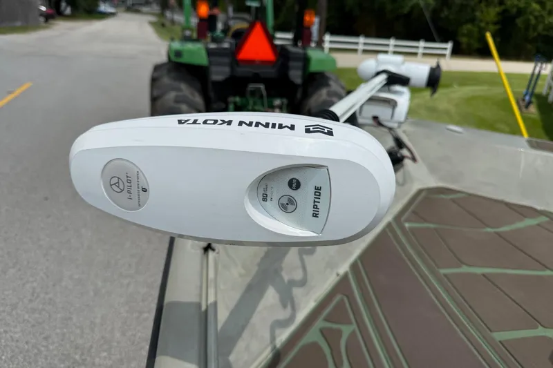 Slide: The Image of Minn Kota Riptide motor on 2021 Alumacraft 2072 All Weld MV CC boat. - 16