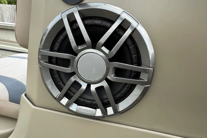 Slide: The Image of Speaker on 2021 Alumacraft 2072 All Weld MV CC boat, featuring Fusion audio system. - 17