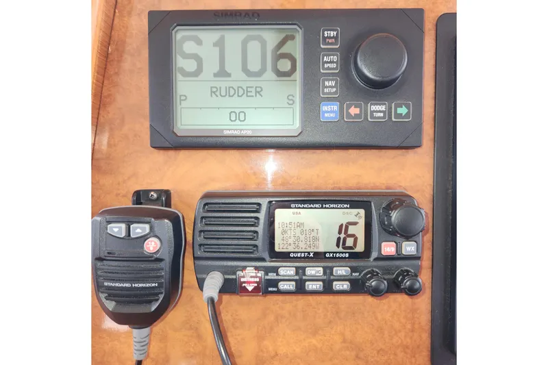 Slide: The Image of Control panel of a 2001 Ocean Alexander Classico yacht with navigation instruments. - 103