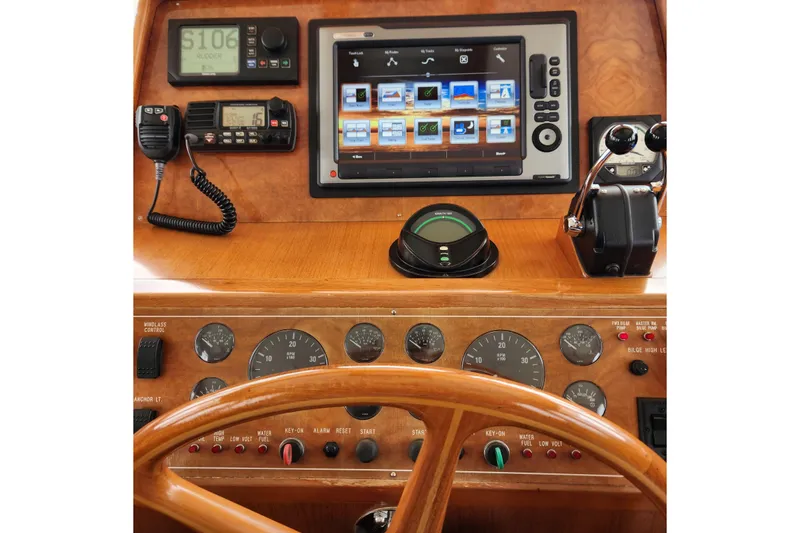Slide: The Image of Cockpit of 2001 Ocean Alexander Classico yacht with navigation instruments and controls. - 40