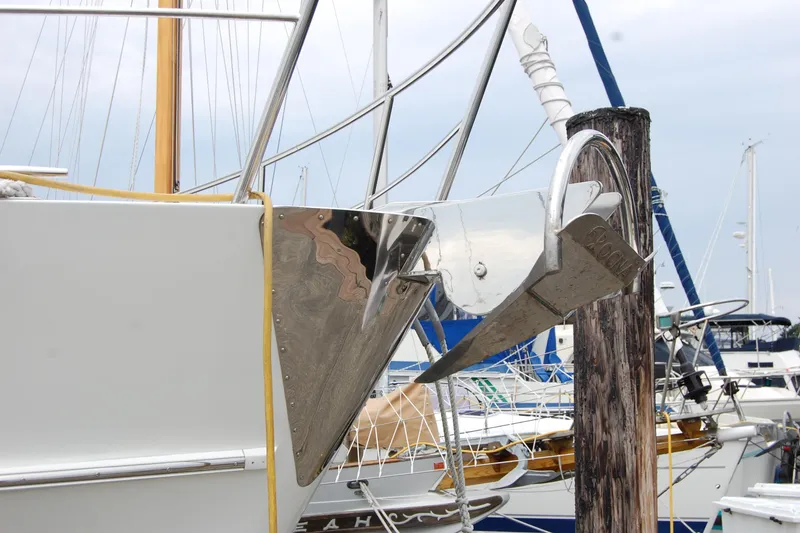 Slide: The Image of Bow of 2001 Ocean Alexander Classico yacht with anchor at marina. - 6