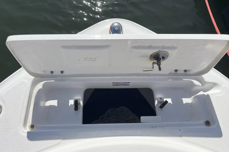 Slide: The Image of Open storage compartment on 2019 Robalo R222 Explorer boat deck. - 8