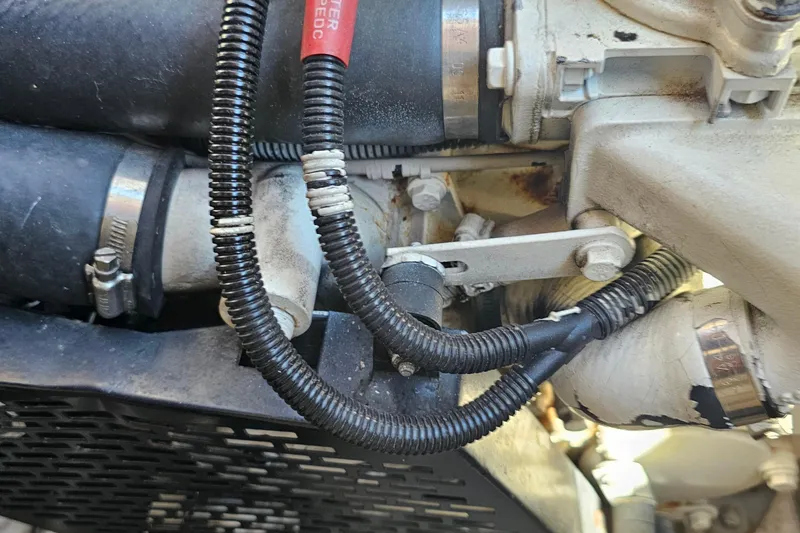 Slide: The Image of Close-up of 2005 Regal Commodore 4260 engine components with hoses and wiring. - 38