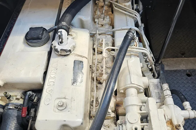 Slide: The Image of Engine of a 2005 Regal Commodore 4260 boat, featuring Volvo components. - 42