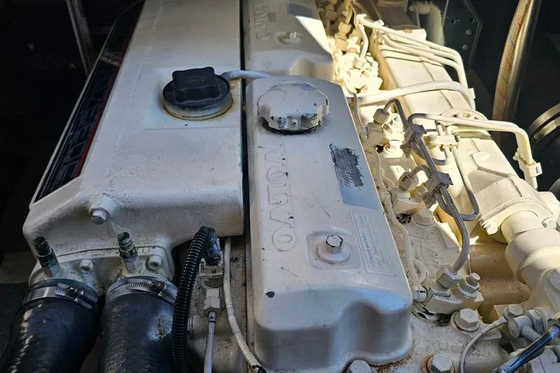 Slide: The Image of Engine of a 2005 Regal Commodore 4260 boat, featuring Volvo components. - 43