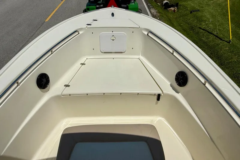 Slide: The Image of 2008 Scout 222 Sportfish boat interior with seating and storage compartments. - 14