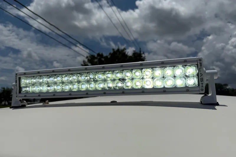 Slide: The Image of LED light bar on 2008 Scout 222 Sportfish under cloudy sky. - 21