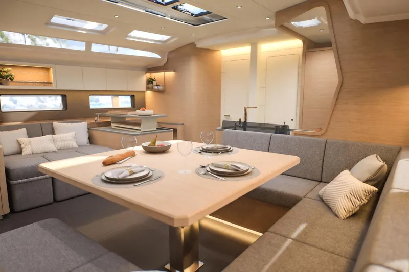 Slide: The Image of Luxurious interior of 2026 Dufour 54 yacht with elegant dining area and modern design. - 32