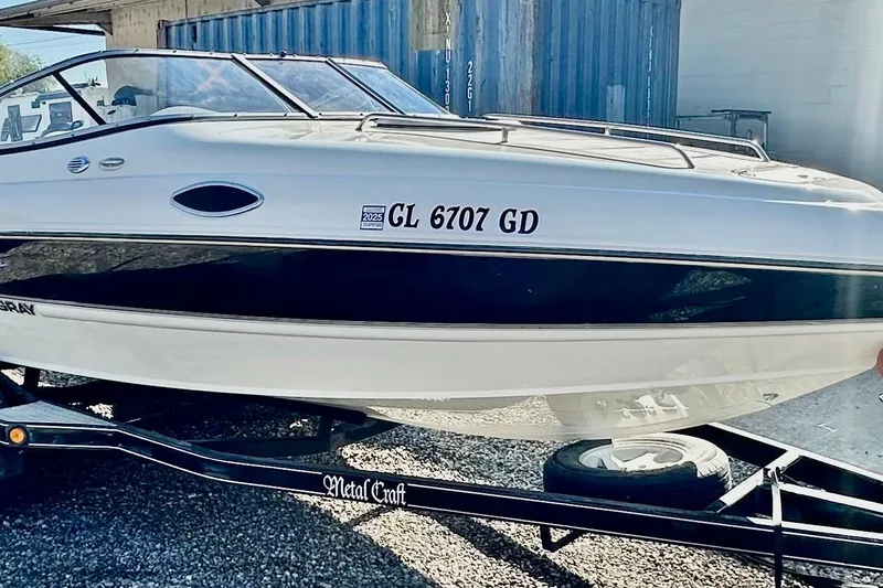Slide: The Image of 2010 Stingray 205 CS/CX boat on trailer, registration GL 6707 GD. - 1