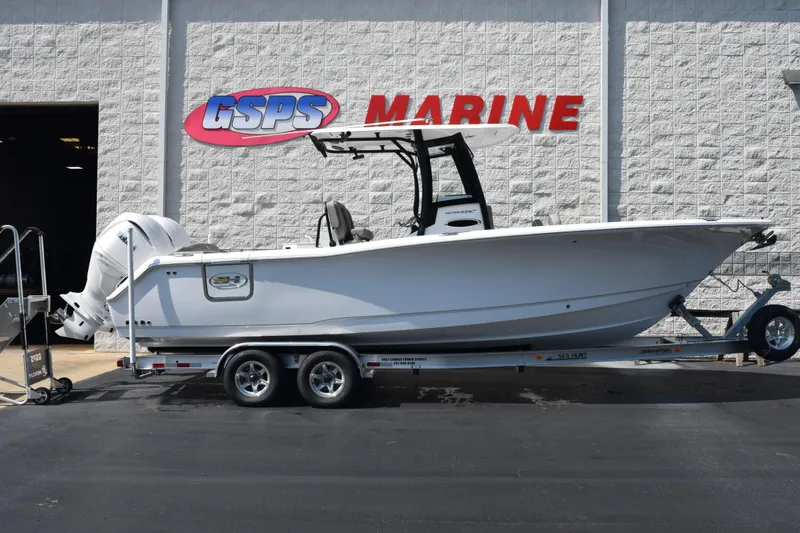 Slide: The Image of 2026 Sea Hunt Ultra 275 SE boat on trailer at GSPS Marine dealership. - 1