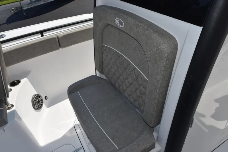 Slide: The Image of 2026 Sea Hunt Ultra 275 SE boat seat with gray upholstery and diamond stitching. - 15