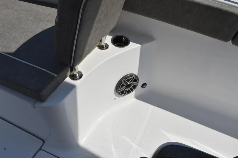 Slide: The Image of 2026 Sea Hunt Ultra 275 SE boat interior with seating and speaker detail. - 21