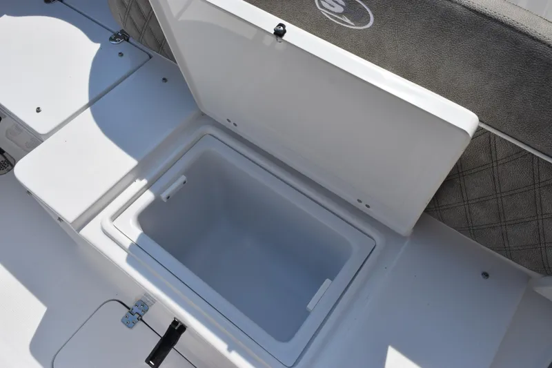 Slide: The Image of Open storage compartment on 2026 Sea Hunt Ultra 275 SE boat. - 31