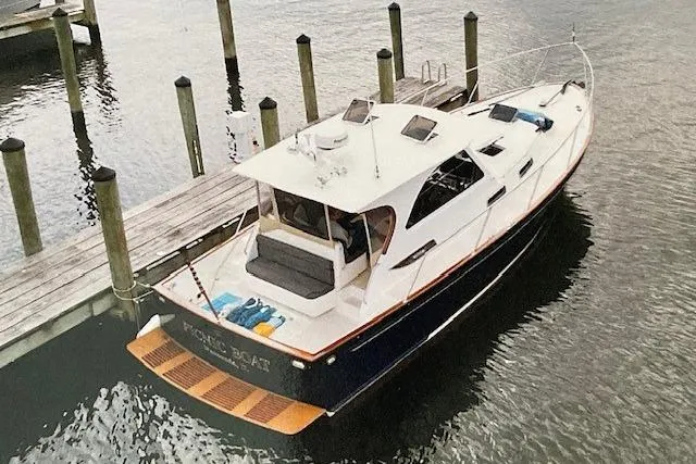 Slide: The Image of 2003 Legacy Yachts 34 Express docked at marina, aerial view. - 37
