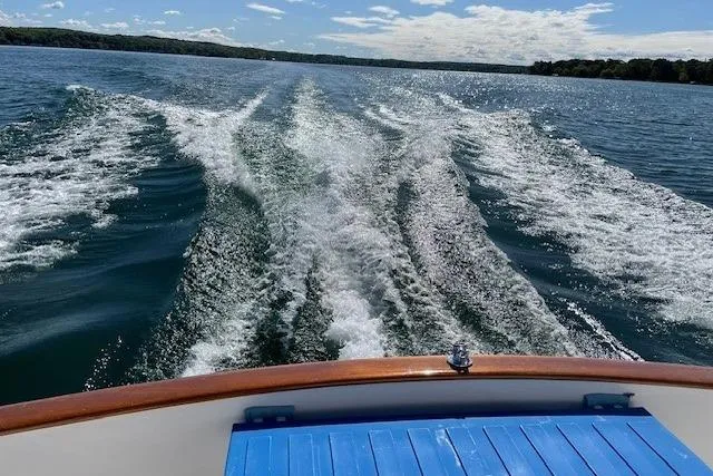 Slide: The Image of Wake of a 2003 Legacy Yachts 34 Express on a sunny day. - 43