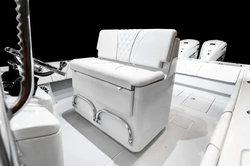 Slide: The Image of 2026 Contender 35 ST boat interior with white seating and dual engines. - 12