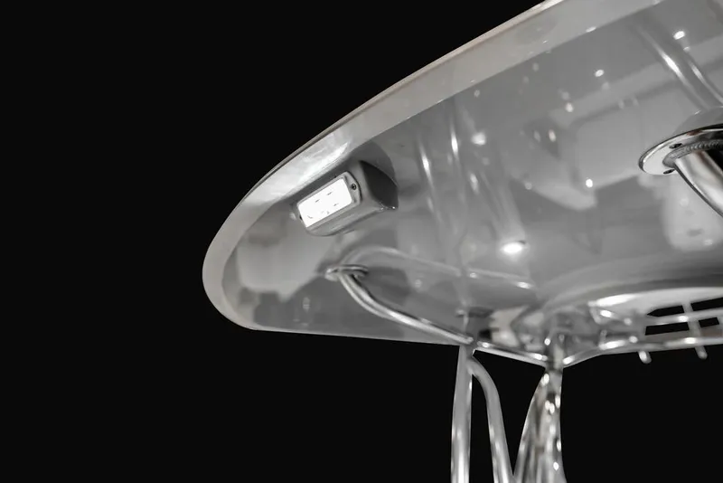 Slide: The Image of 2026 Contender 35 ST boat T-top with integrated LED light, sleek design. - 8