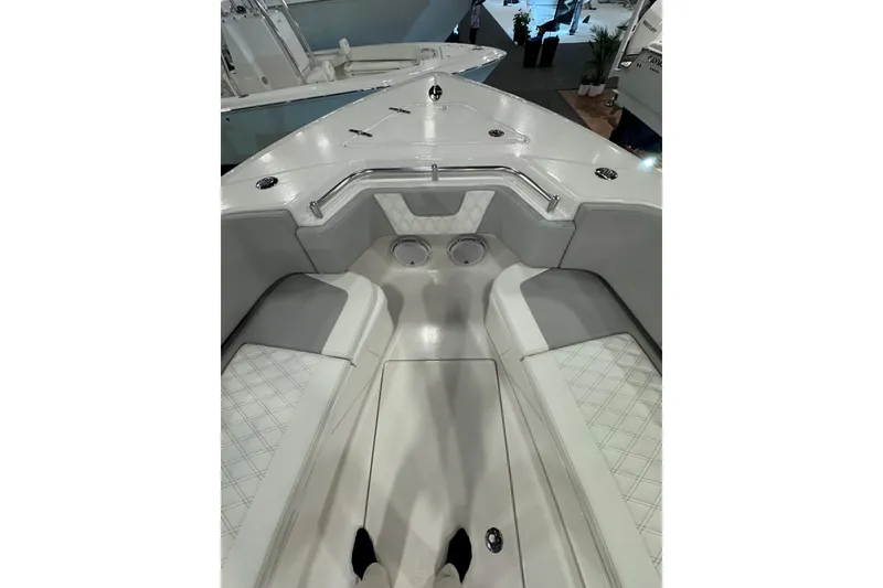 Slide: The Image of 2026 Contender 35 ST boat interior with cushioned seating and sleek design. - 21