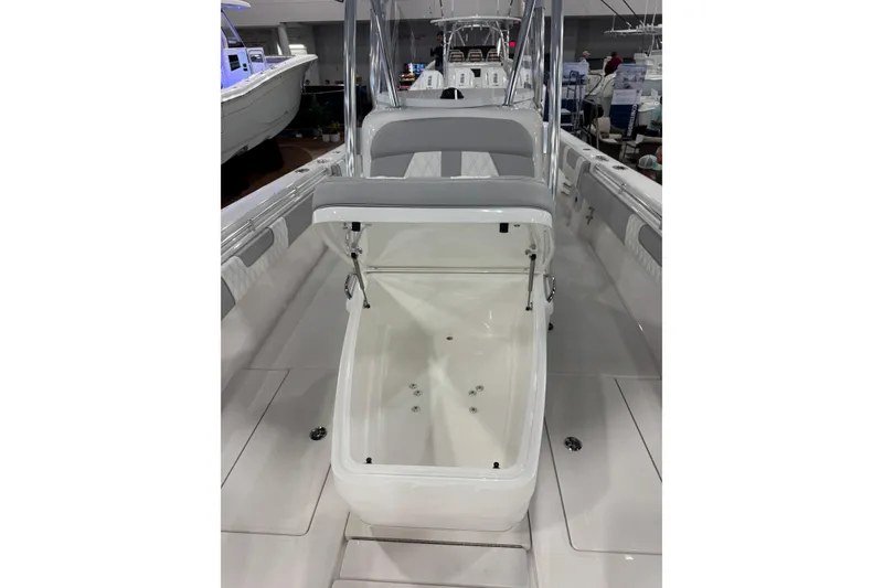 Slide: The Image of 2026 Contender 35 ST boat interior with open storage compartment. - 22