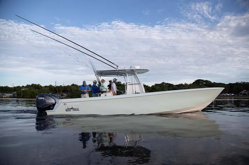 Slide: The Image of 2026 Contender 35 ST boat T-top with integrated LED light, sleek design. - 5